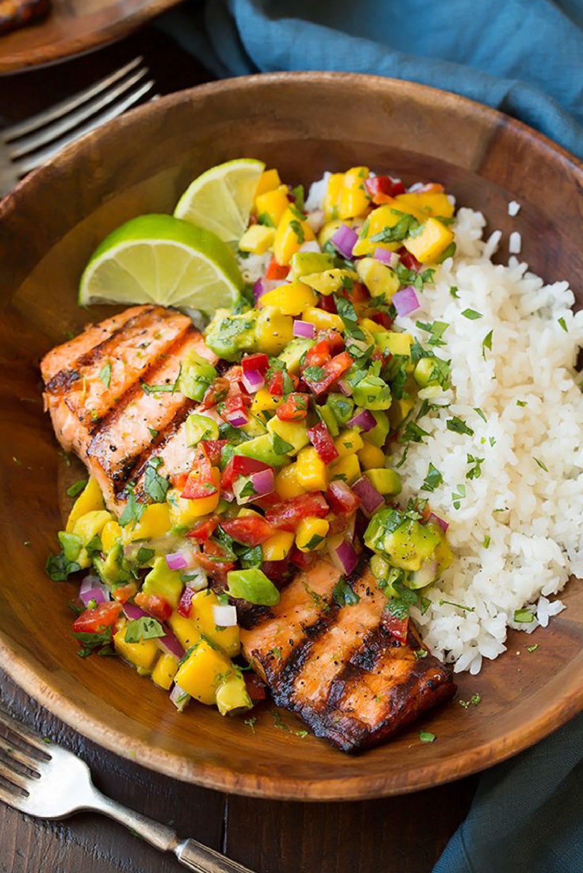 grilled lime salmon with avocado mango salsa on plate