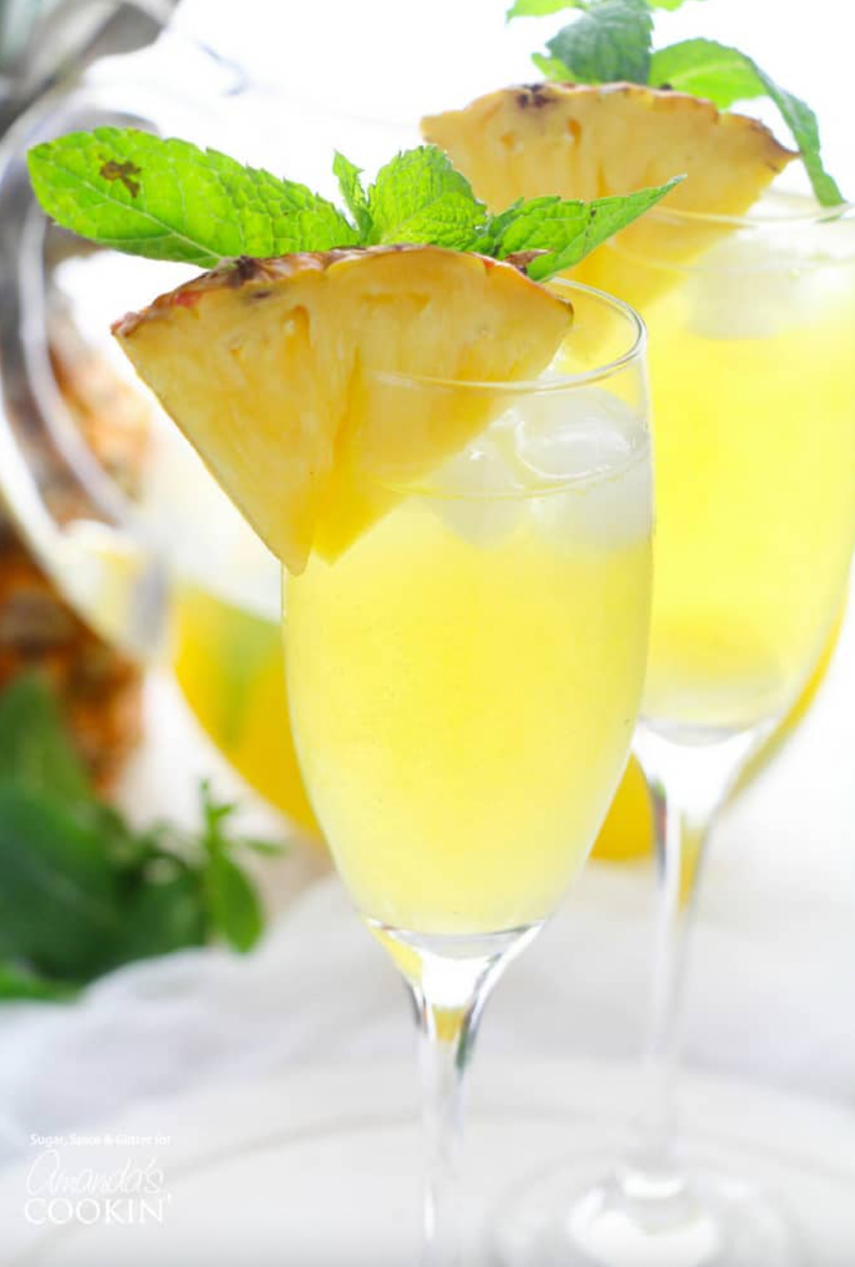 glasses of pineapple prosecco punch