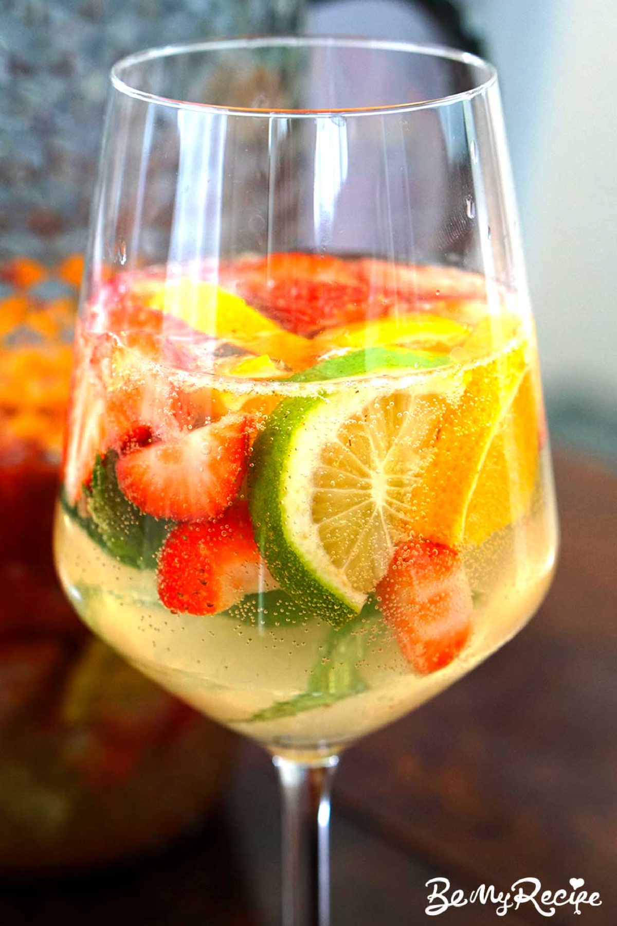 glass of sparkling strawberry prosecco sangria