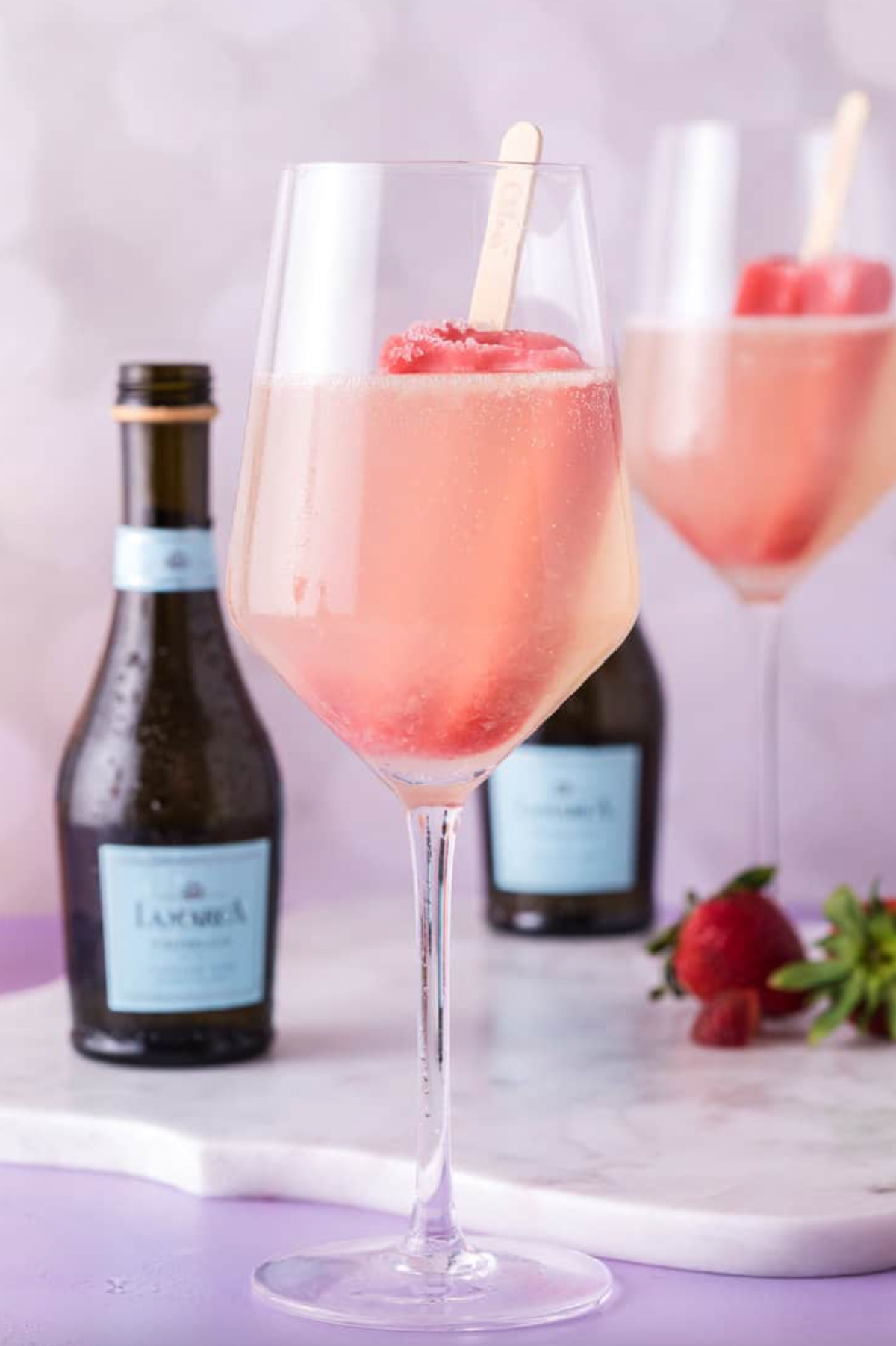 glasses of strawberry popsicle prosecco cocktails