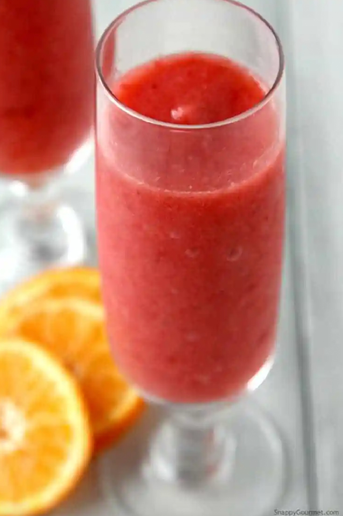 glass of strawberry prosecco slushie