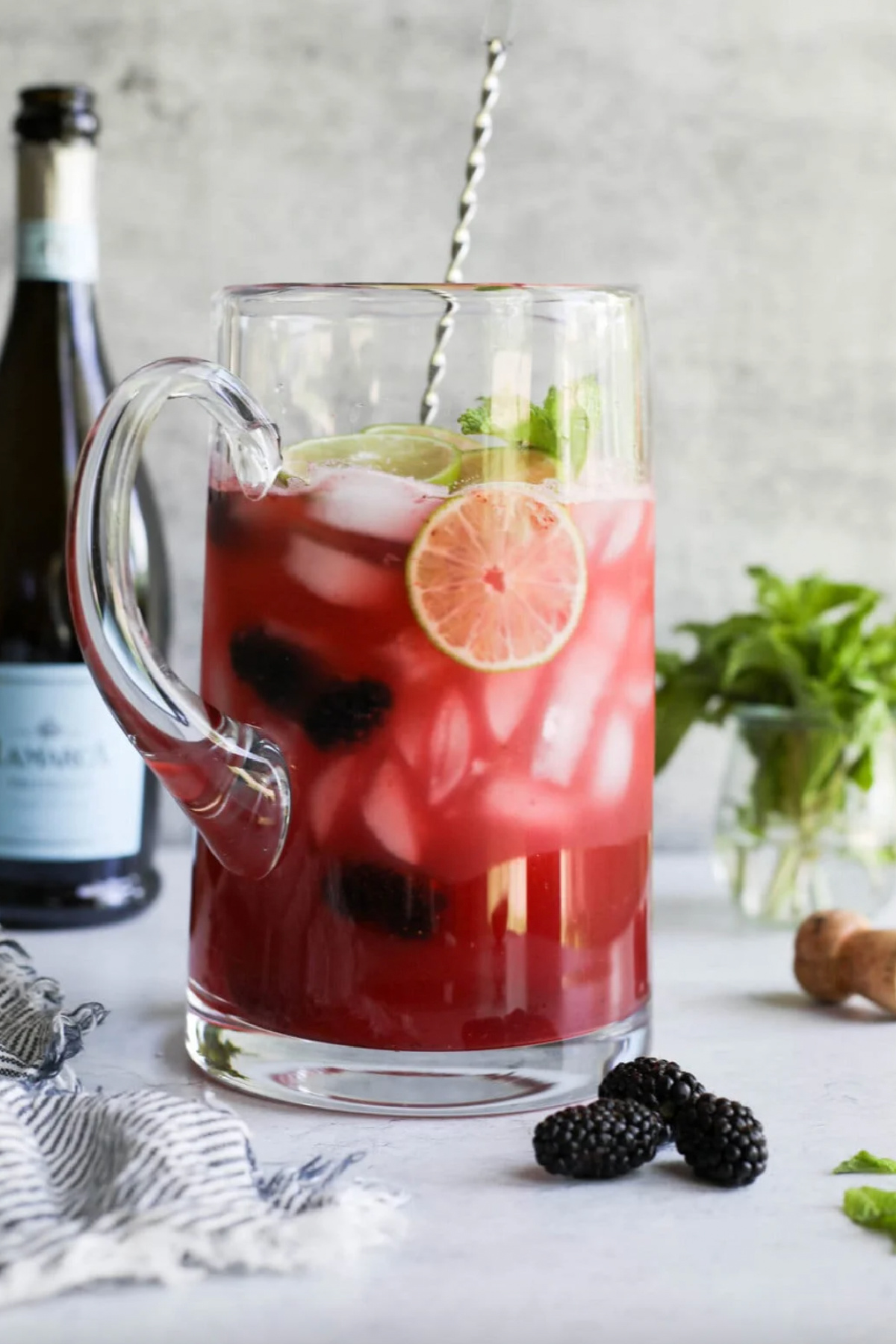 pitcher of blackberry lime prosecco cocktails