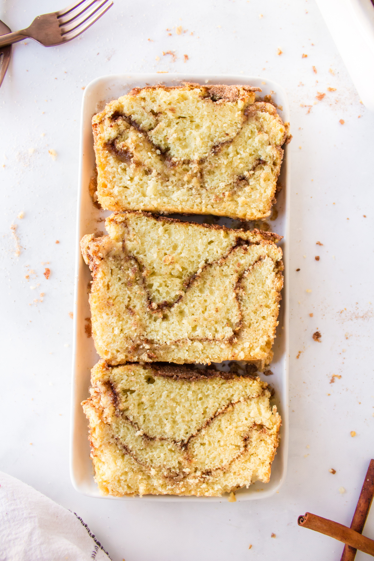 three slices of cinnamon swirl bread on a platter