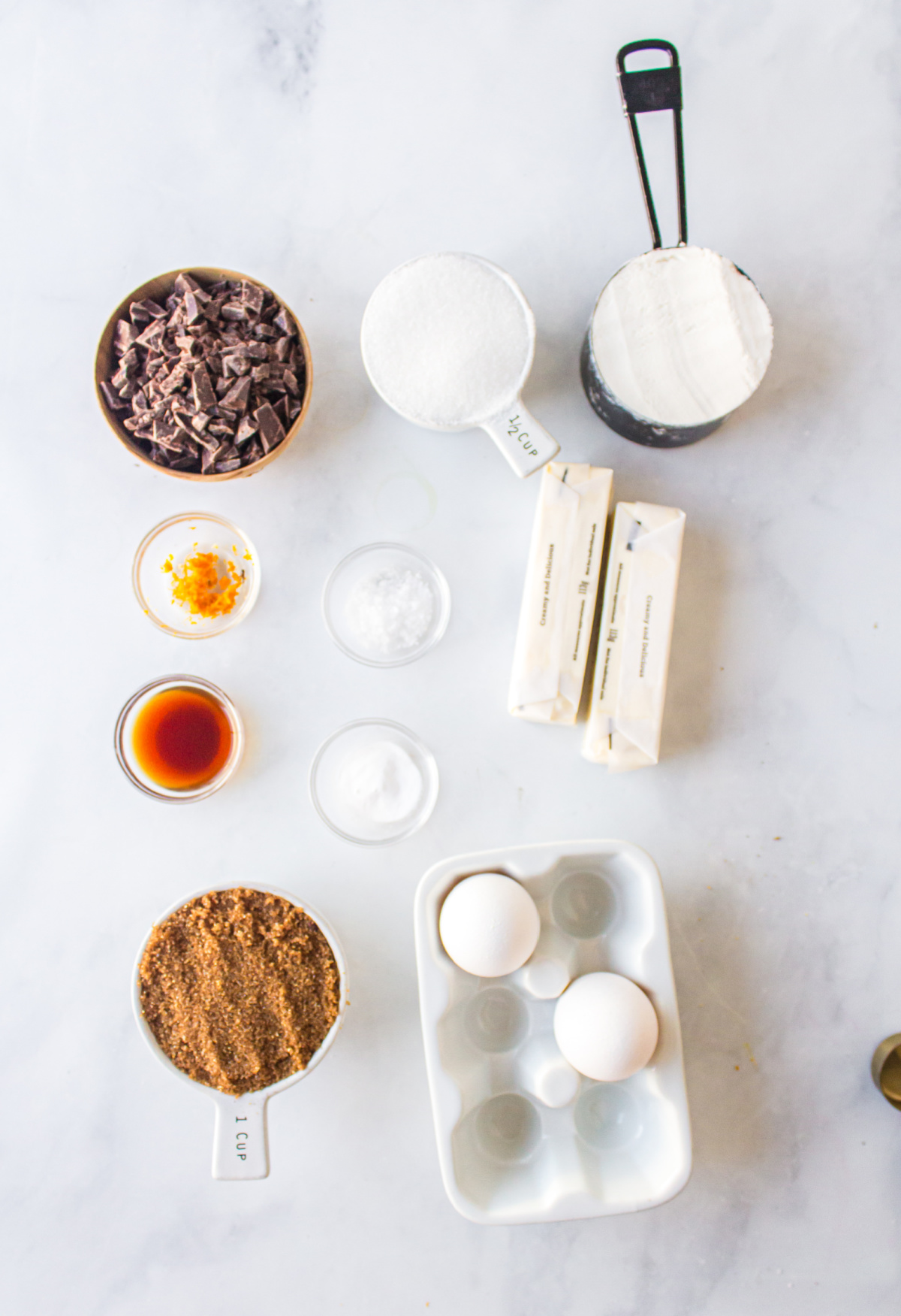 ingredients displayed for making dark chocolate chunk cookies