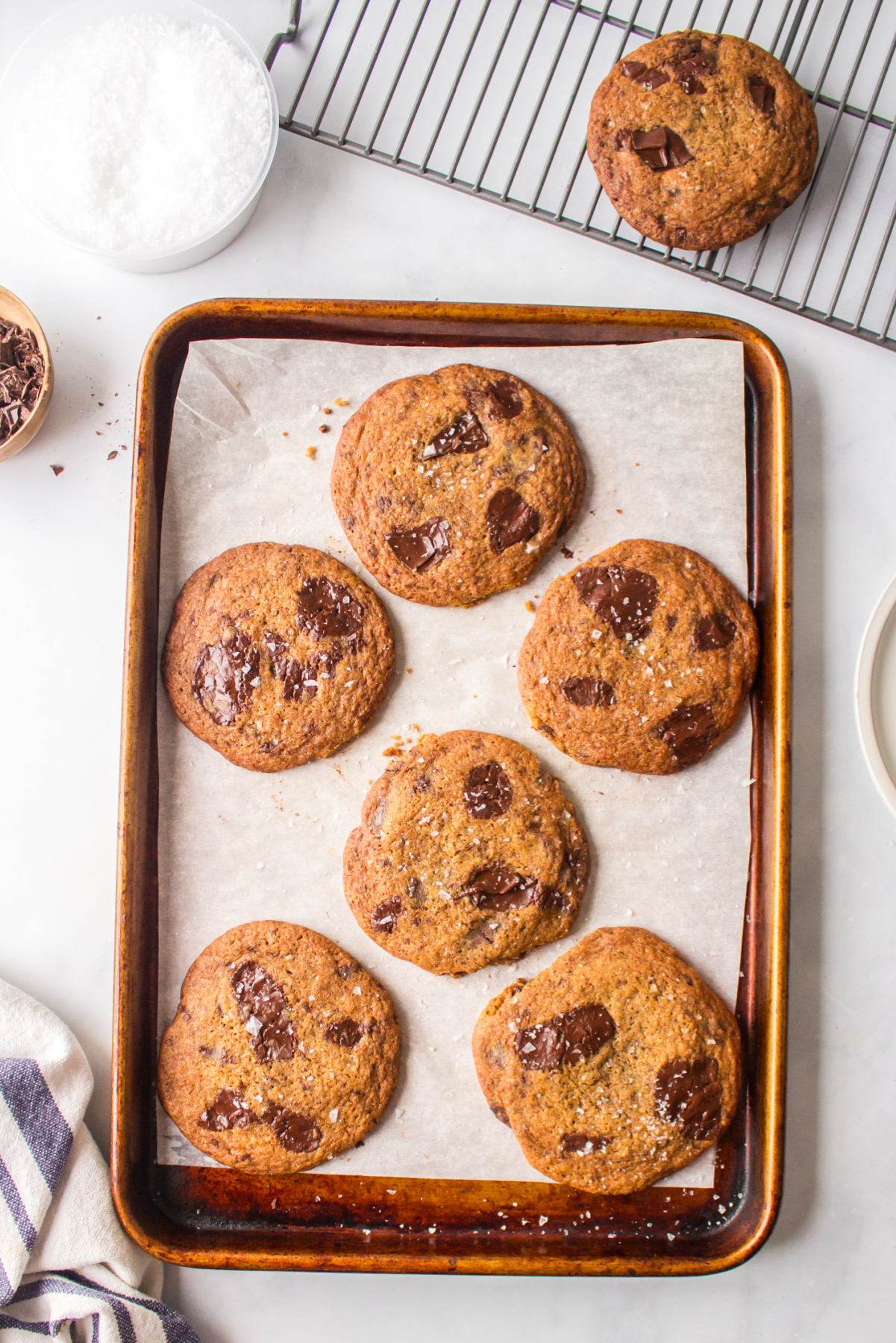 dark chocolate chunk cookies on baking sheet