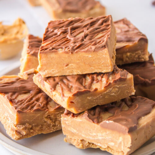 creamy peanut butter fudge stacked on platter