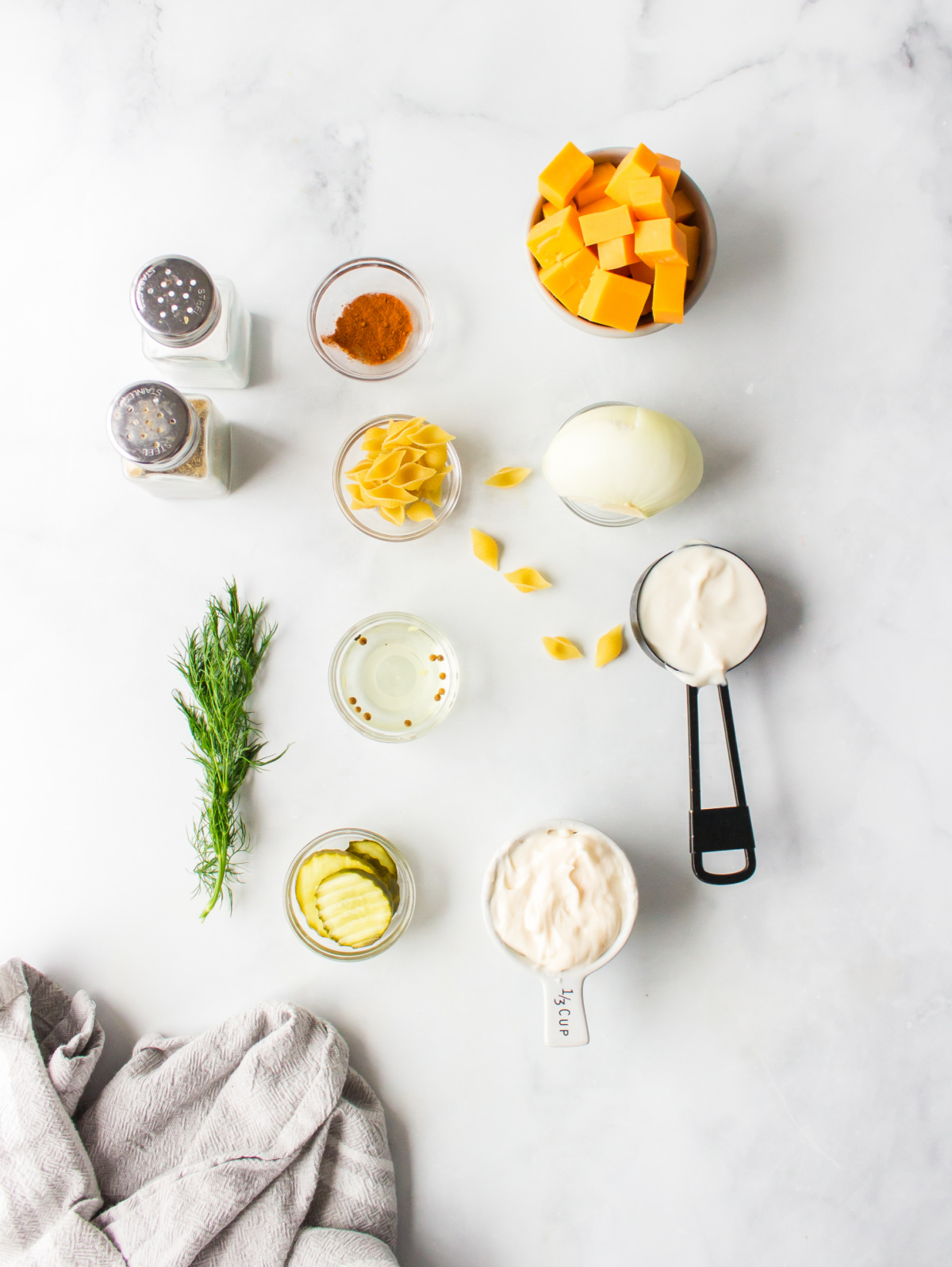 ingredients displayed for making dill pickle pasta salad