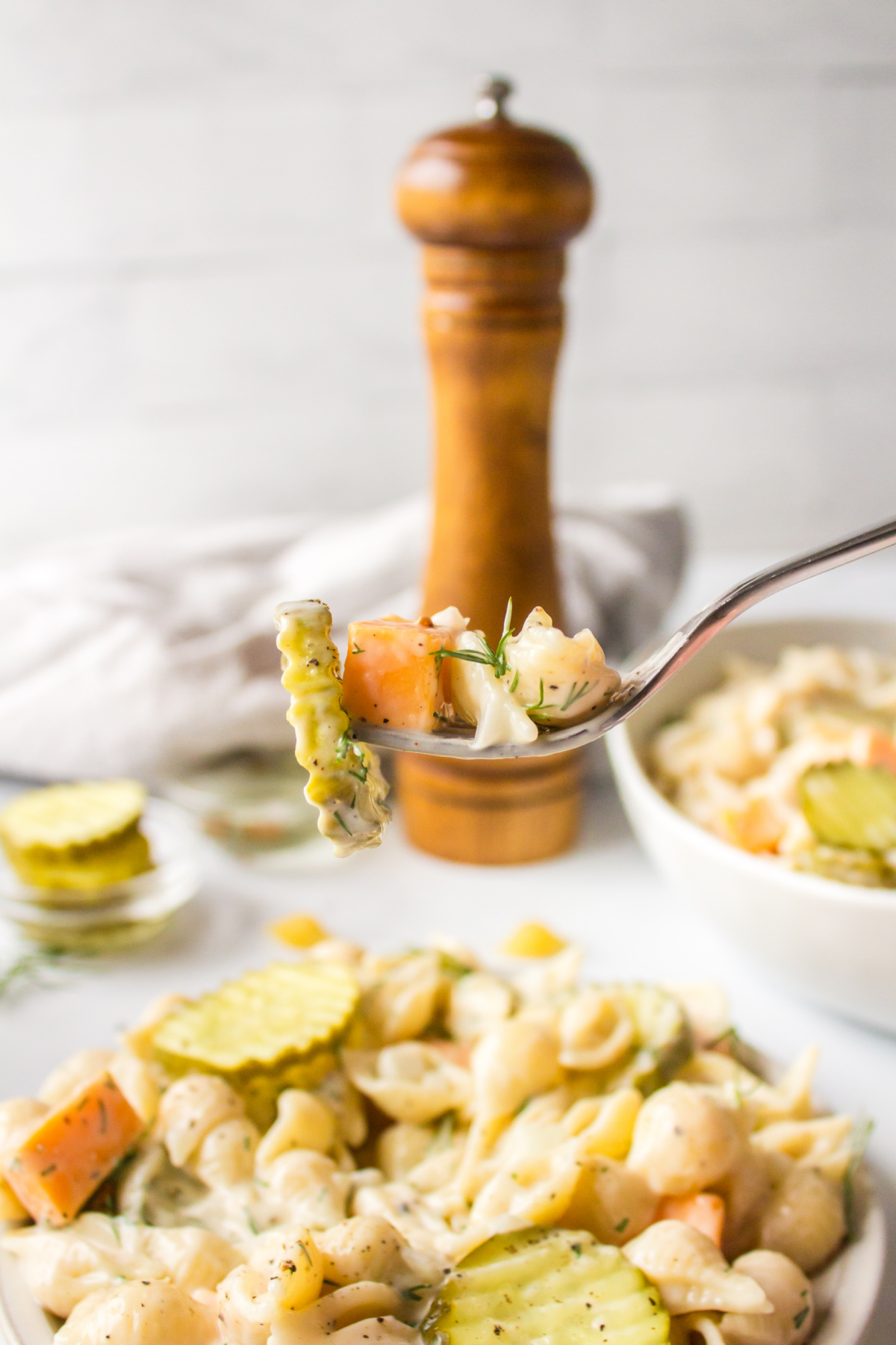 fork full of dill pickle pasta salad