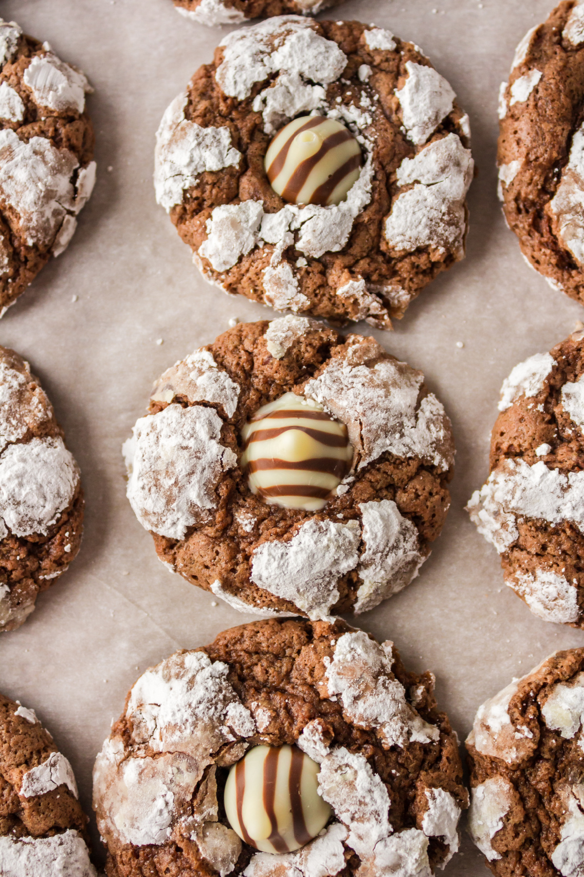 chocolate kiss crinkle cookies on baking sheet