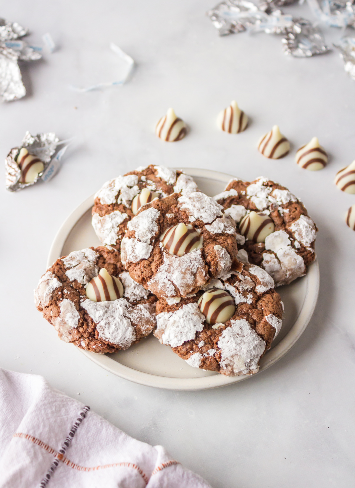 plate of chocolate kiss crinkle cookies