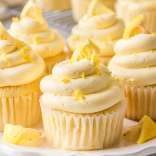 lemon cupcakes with lemon frosting on platter