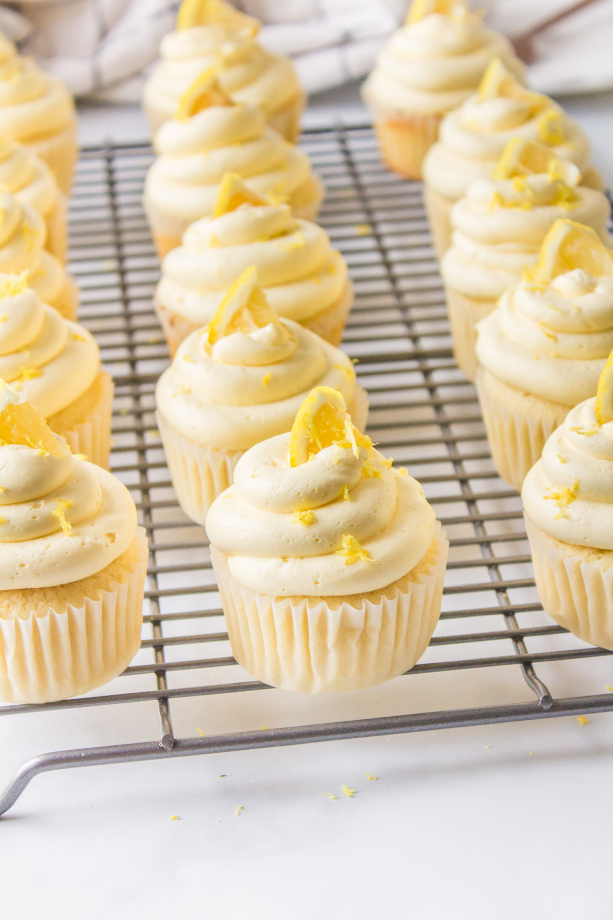 lemon cupcakes on a cooling rack