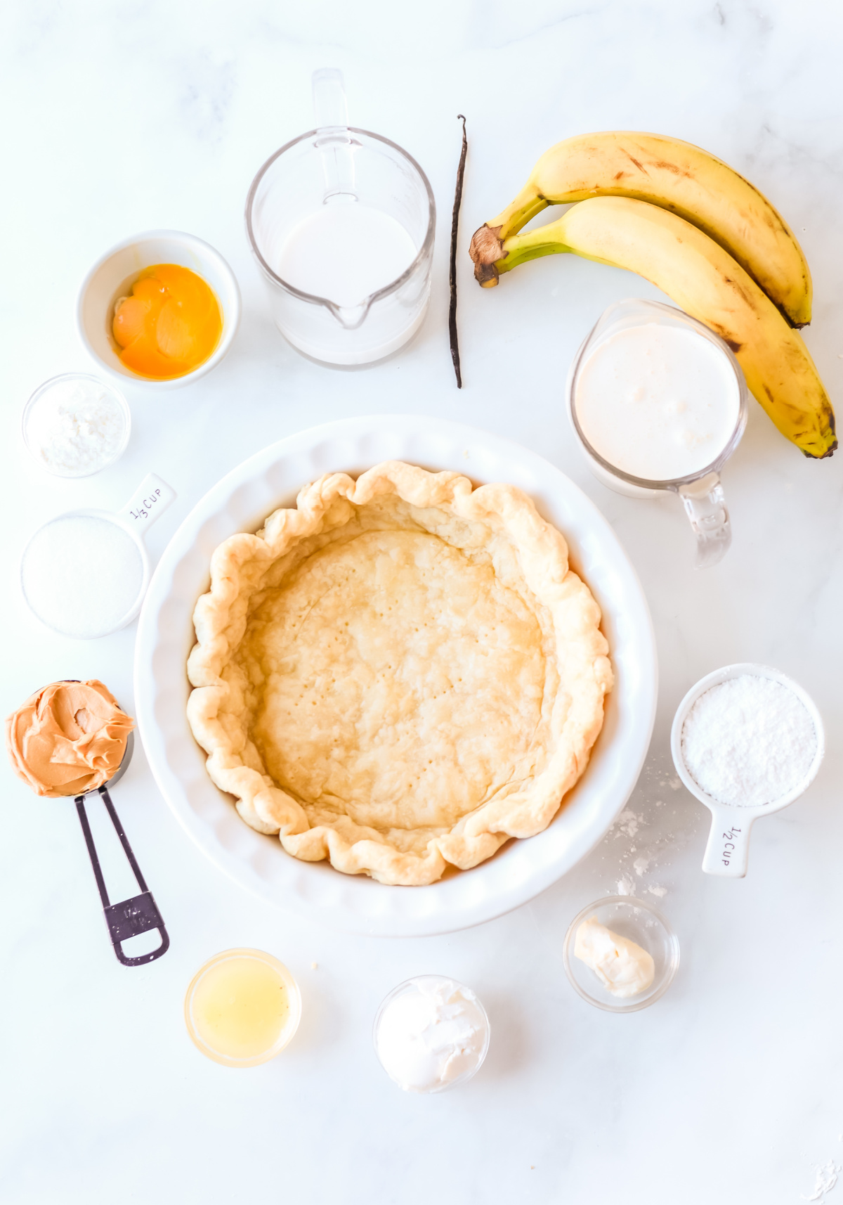 ingredients displayed for making peanut butter banana cream pie