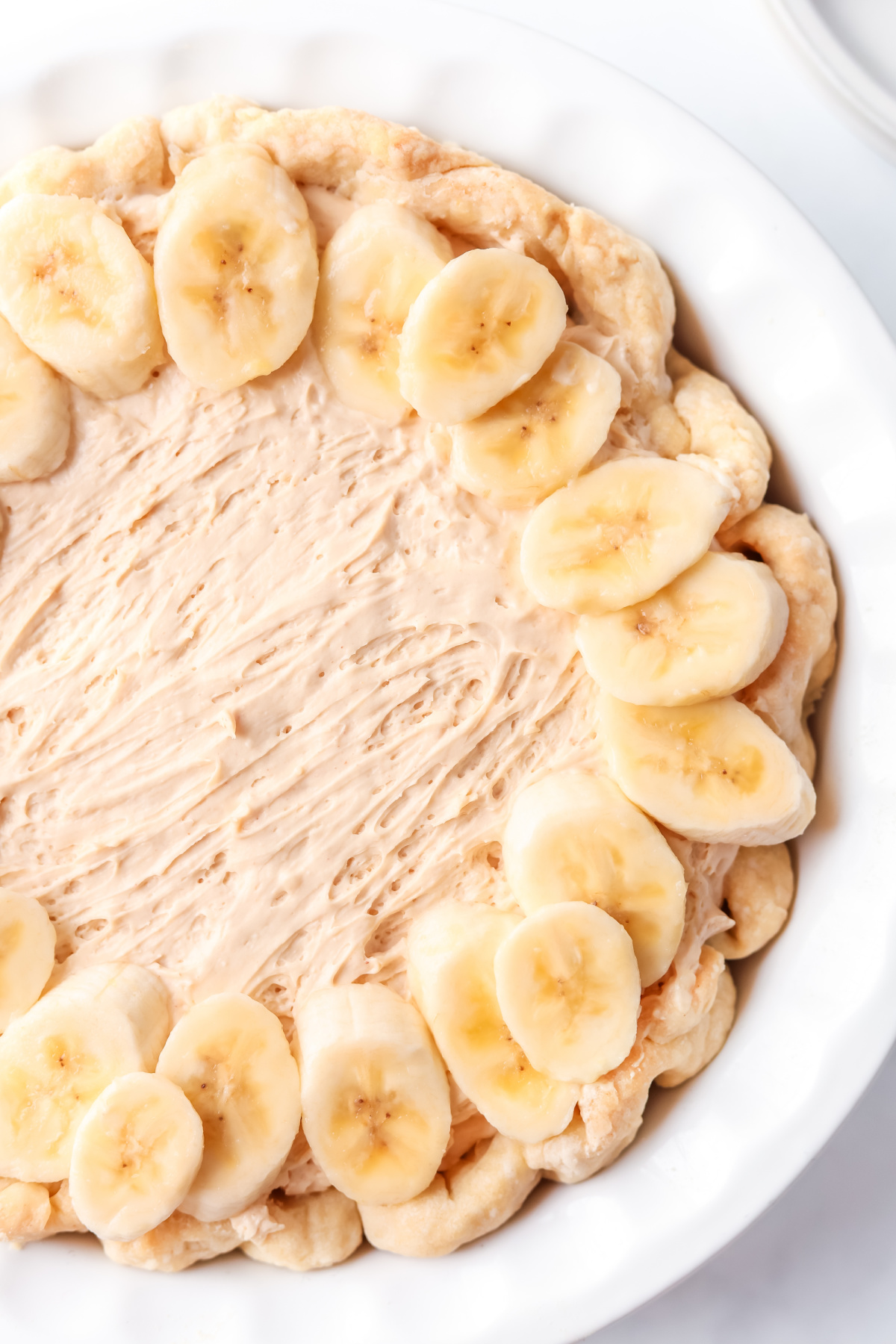 overhead shot of peanut butter banana cream pie