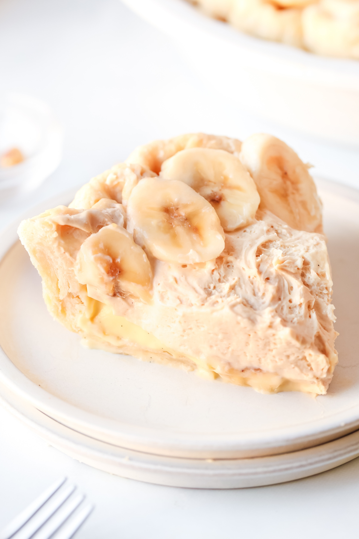 slice of peanut butter banana cream pie