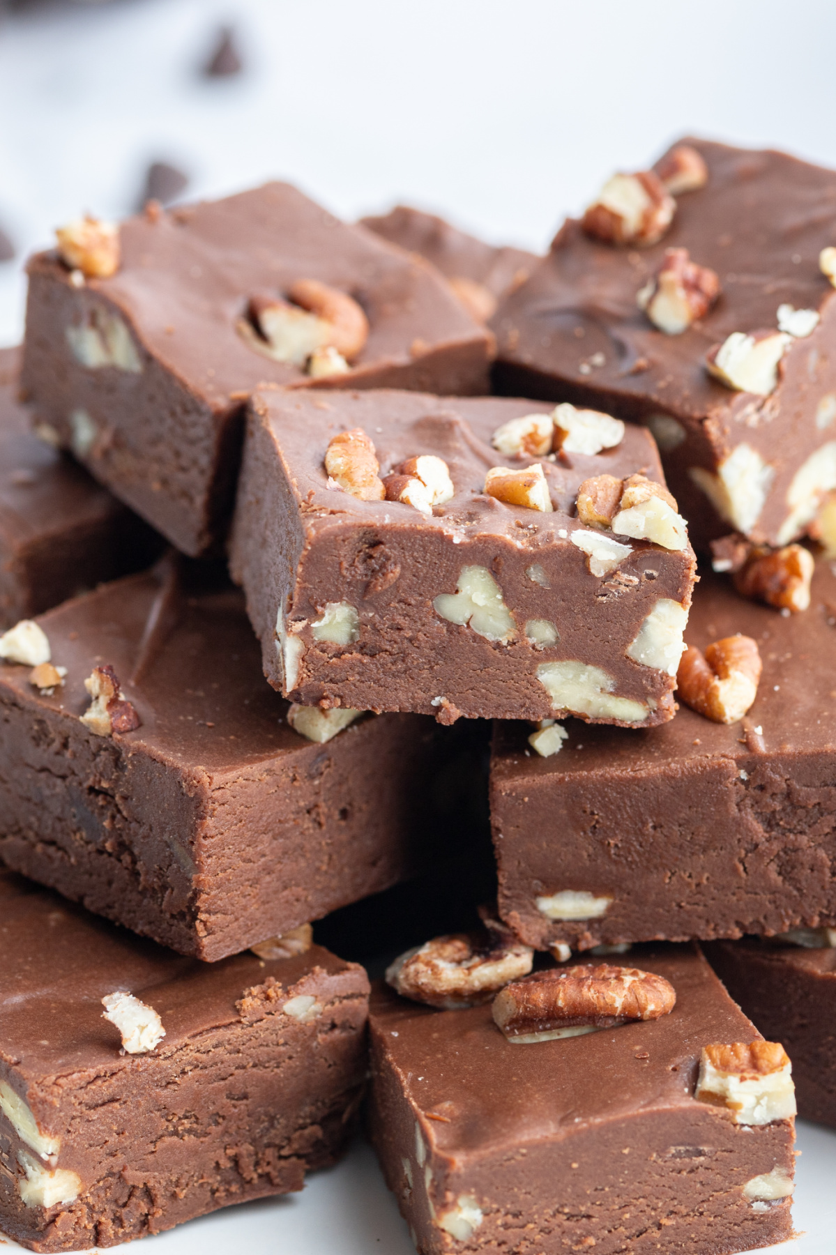 Chocolate Fudge with Pecans recipe from RecipesForHolidays.com stacked fudge with pecans